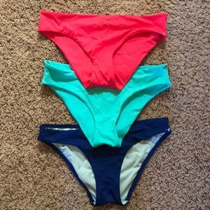 Three Victoria’s Secret bathing suit bottoms